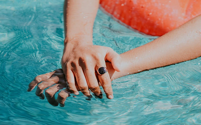 Large sparkling blue swimming pool 