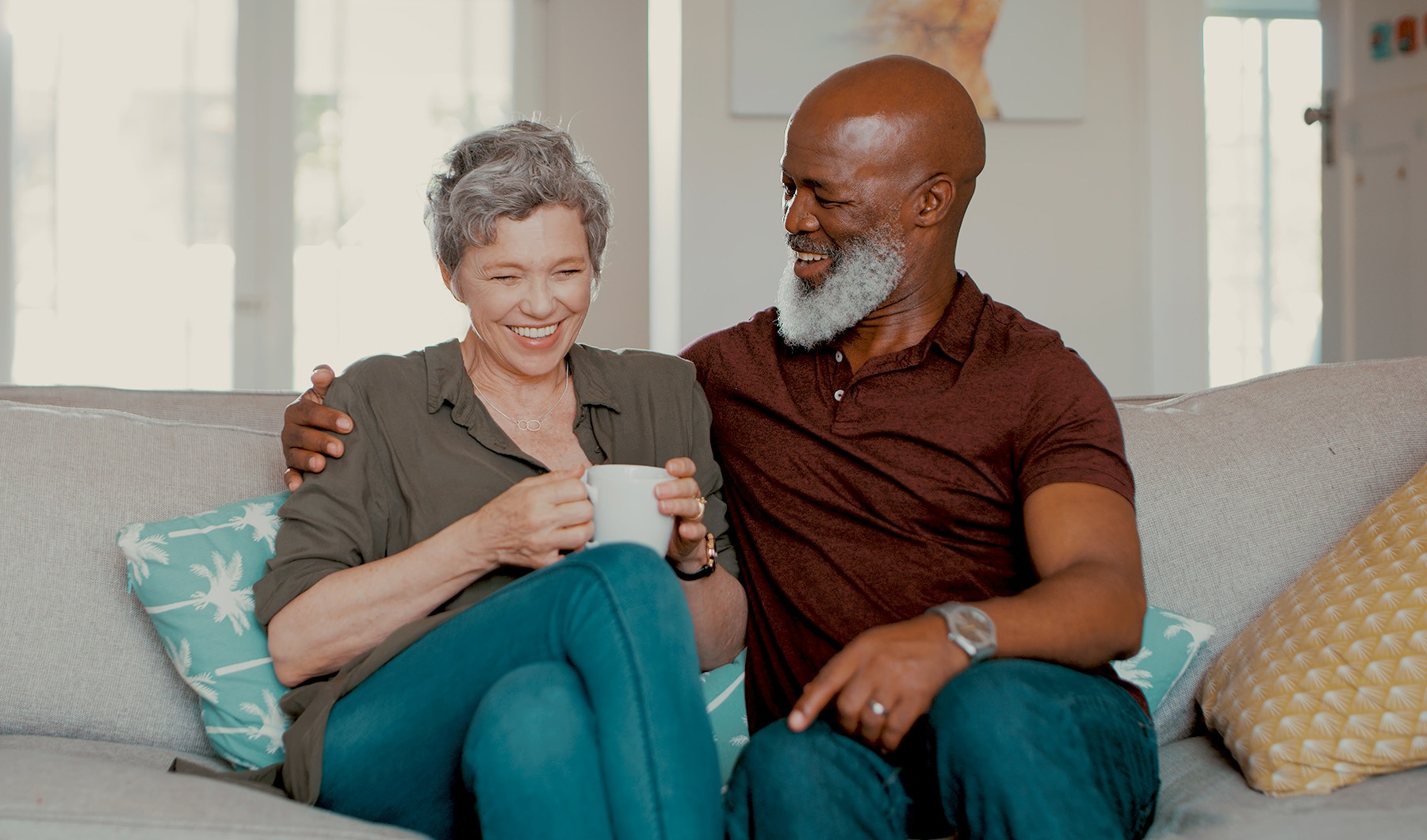 Couple sitting in their living room 